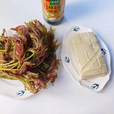 咸香椿拌豆腐做法(春日时令美味尝鲜) 咸香椿拌豆腐做法 春日时令美味尝鲜